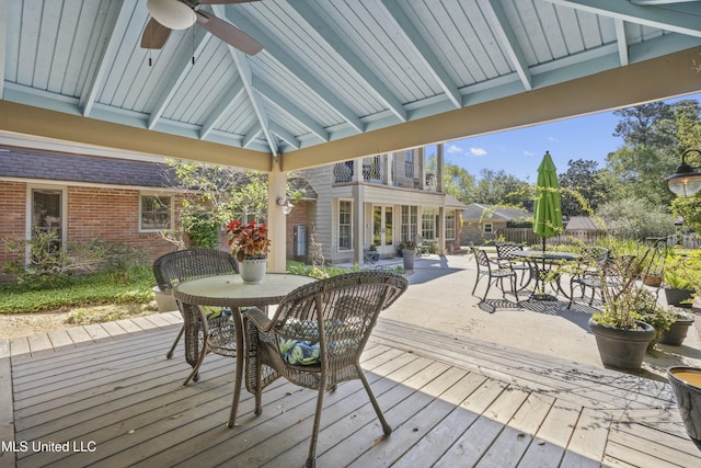 2629 Park View Dr, Biloxi, MS 39531 - deck with outdoor dining area, ceiling fan, and fence