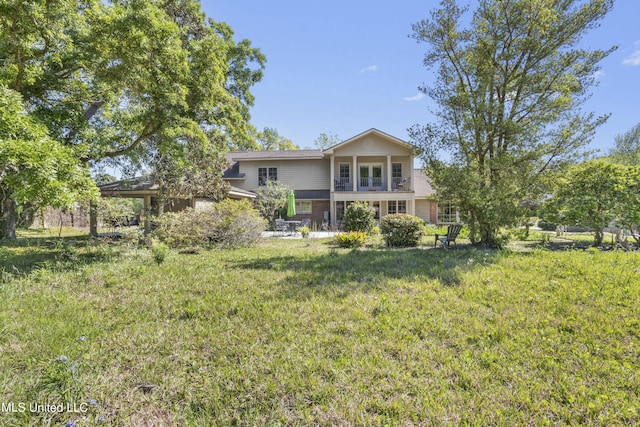2629 Park View Dr, Biloxi, MS 39531 - rear view of property featuring a balcony and a lawn