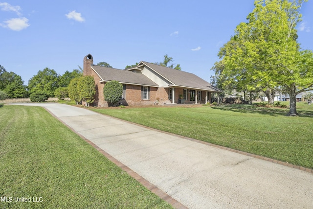 2629 Park View Dr, Biloxi, MS 39531 - ranch-style house featuring concrete driveway, a front lawn, brick siding, and a chimney