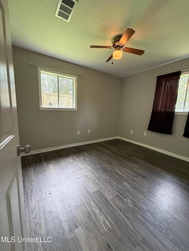 448 Ruston St, Pearl, MS 39208 - unfurnished room featuring a ceiling fan and dark wood finished floors