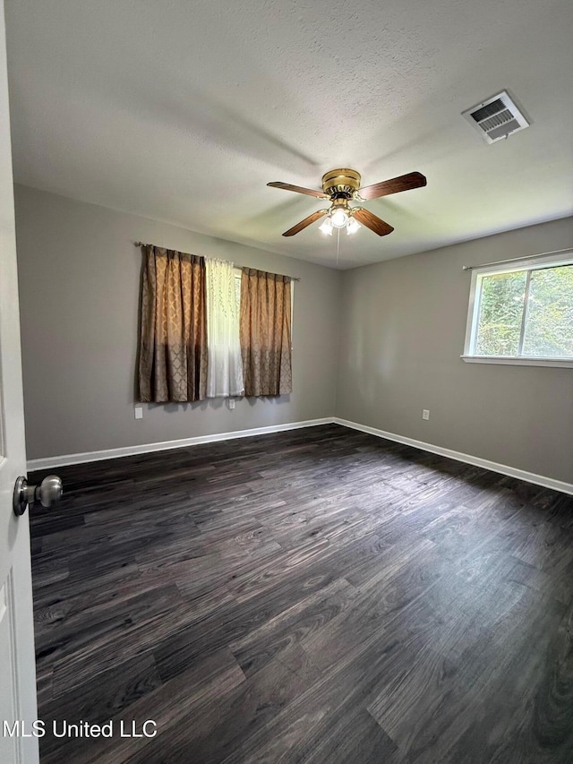 448 Ruston St, Pearl, MS 39208 - unfurnished room featuring dark wood-style flooring and ceiling fan