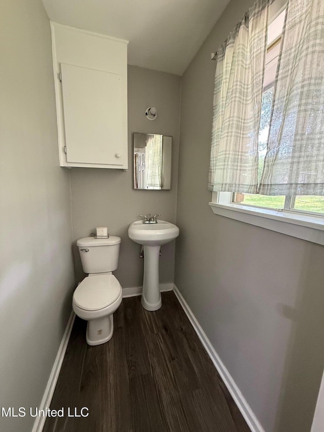 448 Ruston St, Pearl, MS 39208 - bathroom with wood finished floors and toilet