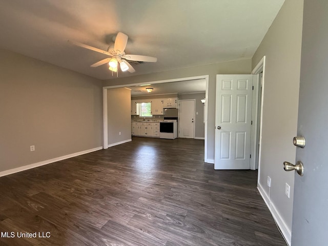 448 Ruston St, Pearl, MS 39208 - unfurnished living room with a ceiling fan and dark wood-style floors
