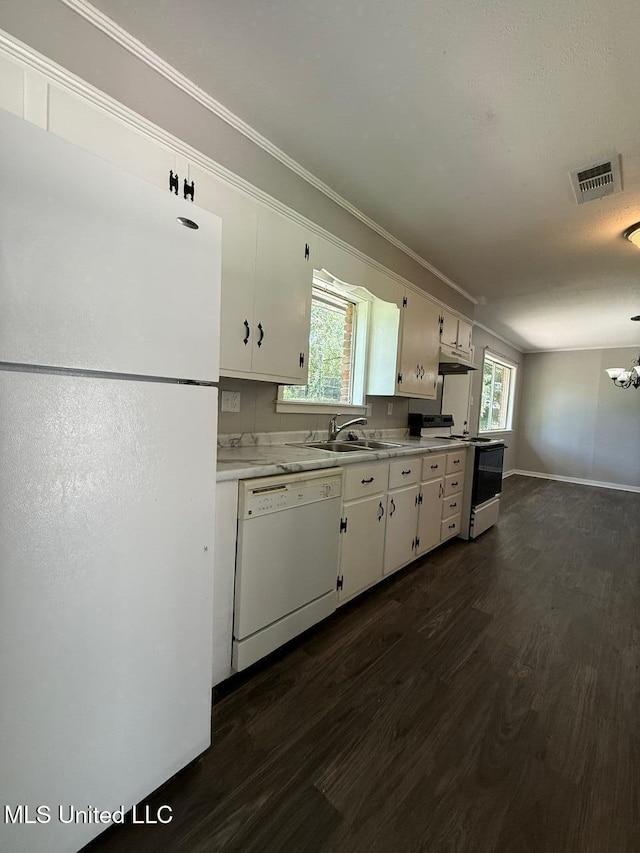 448 Ruston St, Pearl, MS 39208 - kitchen featuring white appliances, dark wood-style floors, white cabinets, and crown molding