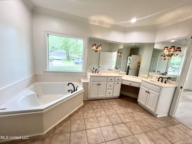 bathroom featuring ornamental molding, a garden tub, healthy amount of natural light, two vanities, and a chandelier