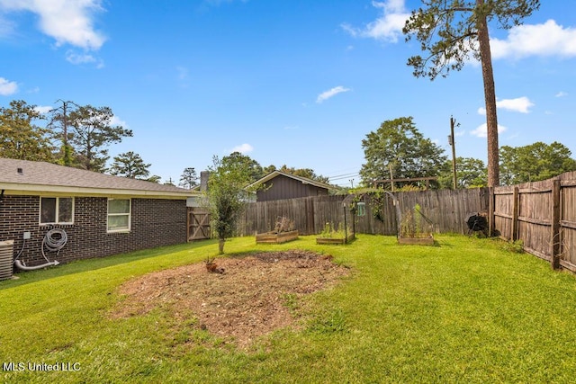 615 Baker St, Wiggins, MS 39577 - view of yard with a vegetable garden and central AC