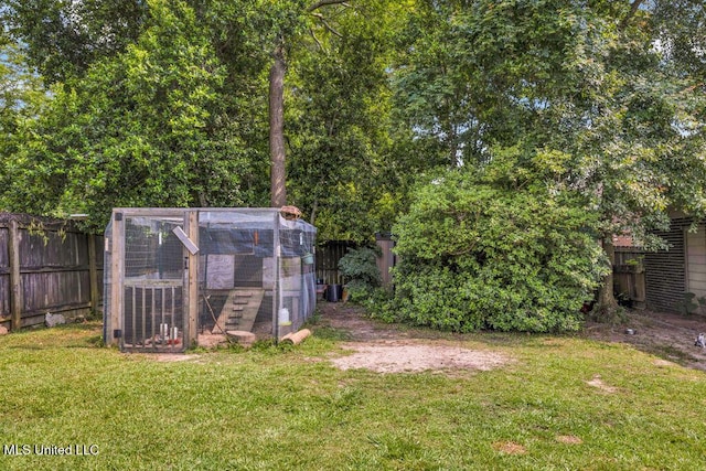 615 Baker St, Wiggins, MS 39577 - view of yard featuring exterior structure and an outbuilding