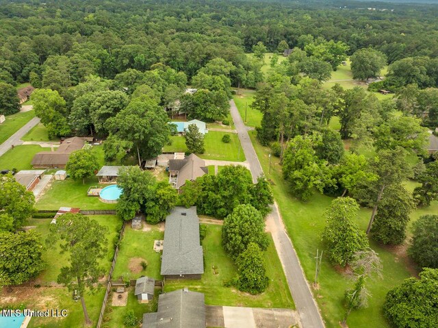 615 Baker St, Wiggins, MS 39577 - aerial view of a heavily wooded area and a pool