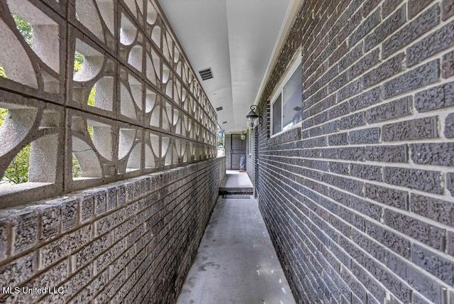 615 Baker St, Wiggins, MS 39577 - view of home's exterior featuring brick siding