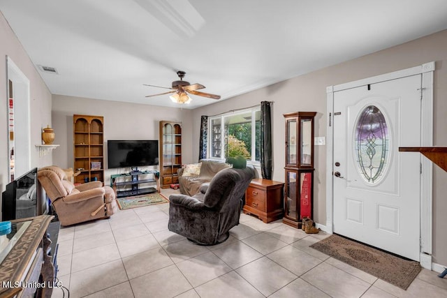 615 Baker St, Wiggins, MS 39577 - foyer entrance with a ceiling fan and light tile patterned floors