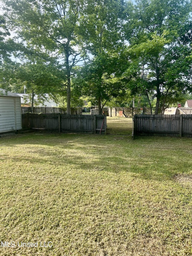 view of yard featuring fence