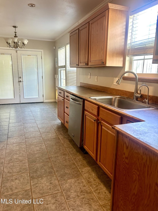 kitchen with stainless steel dishwasher, a chandelier, brown cabinets, ornamental molding, and a sink