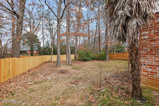 view of yard featuring fence