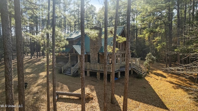 view of playground with a deck