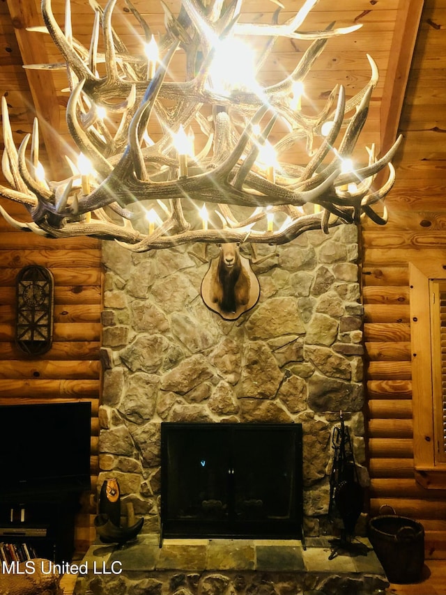 details with a stone fireplace and rustic walls
