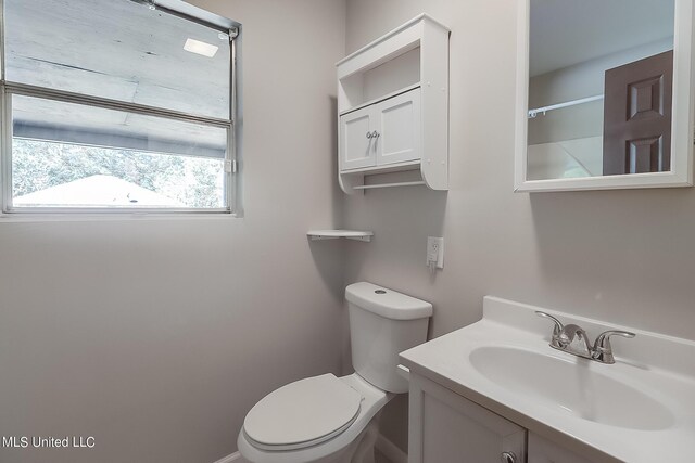 6533 Shawnee St, Kiln, MS 39556 - bathroom featuring toilet and vanity