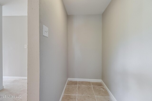 6533 Shawnee St, Kiln, MS 39556 - interior space featuring baseboards and light tile patterned flooring