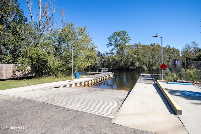 dock area featuring a water view