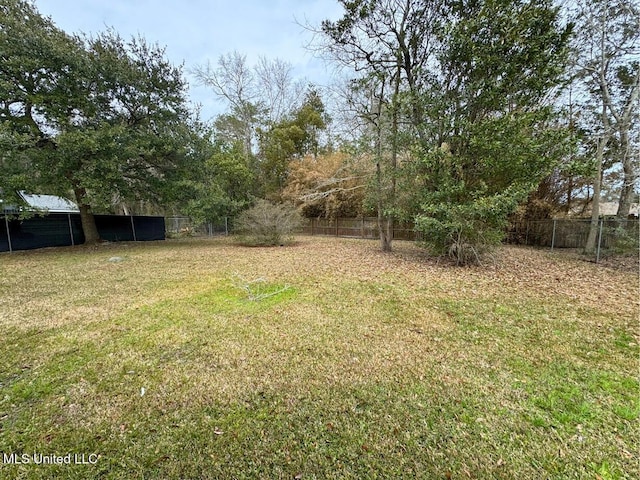 view of yard with fence