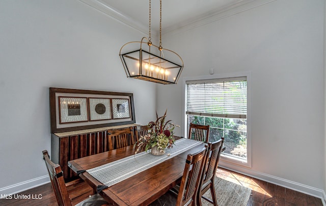 865 Wellington Way, Madison, MS 39110 - dining room with baseboards, dark wood finished floors, crown molding, and a chandelier