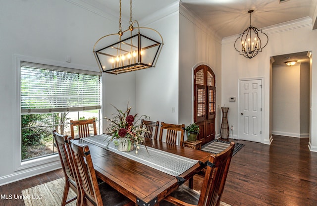 865 Wellington Way, Madison, MS 39110 - dining space featuring a chandelier, crown molding, healthy amount of natural light, dark wood-type flooring, and baseboards