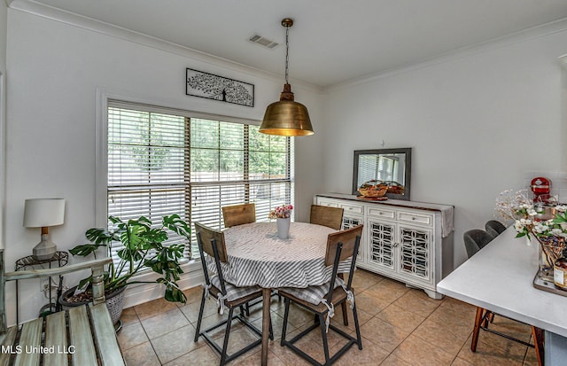 865 Wellington Way, Madison, MS 39110 - dining area with ornamental molding and light tile patterned floors