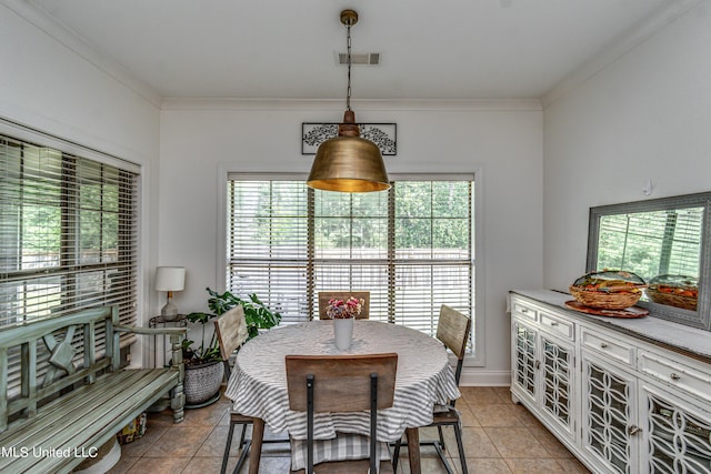 865 Wellington Way, Madison, MS 39110 - dining area featuring healthy amount of natural light, light tile patterned flooring, and ornamental molding