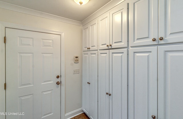 865 Wellington Way, Madison, MS 39110 - doorway featuring baseboards and ornamental molding