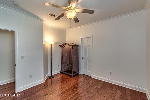 865 Wellington Way, Madison, MS 39110 - unfurnished bedroom with crown molding, baseboards, dark wood-type flooring, and a ceiling fan