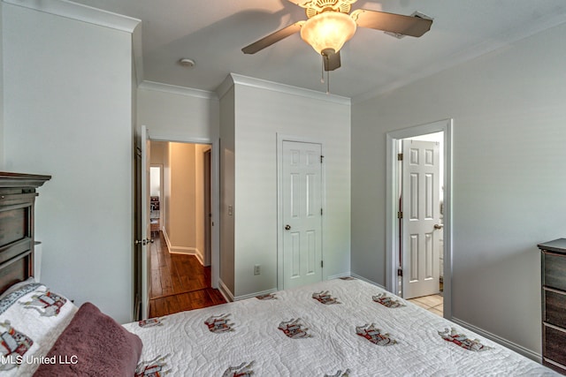 865 Wellington Way, Madison, MS 39110 - bedroom with ornamental molding, a ceiling fan, and wood finished floors