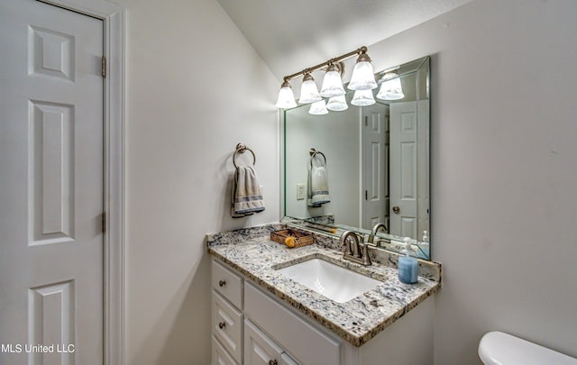 865 Wellington Way, Madison, MS 39110 - bathroom featuring vanity and toilet