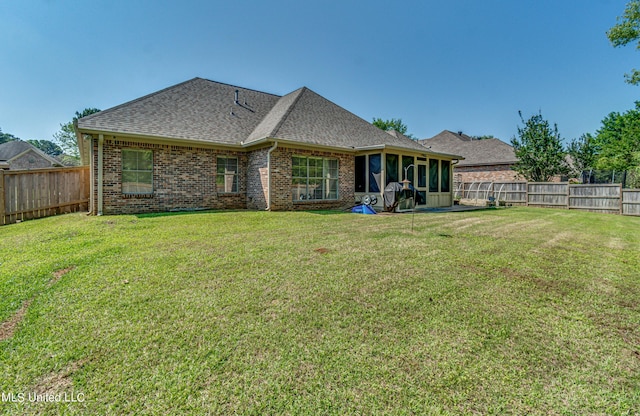 865 Wellington Way, Madison, MS 39110 - rear view of house featuring a sunroom, a shingled roof, and brick siding