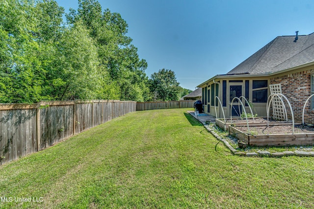 865 Wellington Way, Madison, MS 39110 - view of yard with a garden and a sunroom