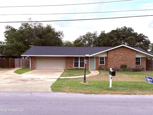 ranch-style home featuring a front yard, a garage, brick siding, fence, and concrete driveway
