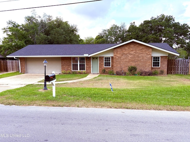 single story home with brick siding, an attached garage, fence, and driveway