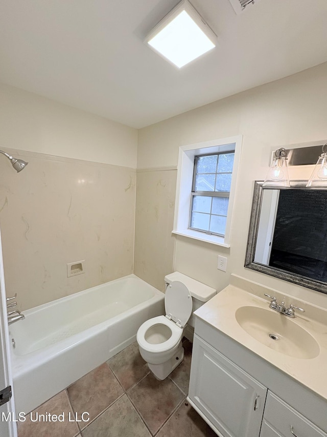full bath featuring tile patterned floors, vanity, toilet, and bathtub / shower combination