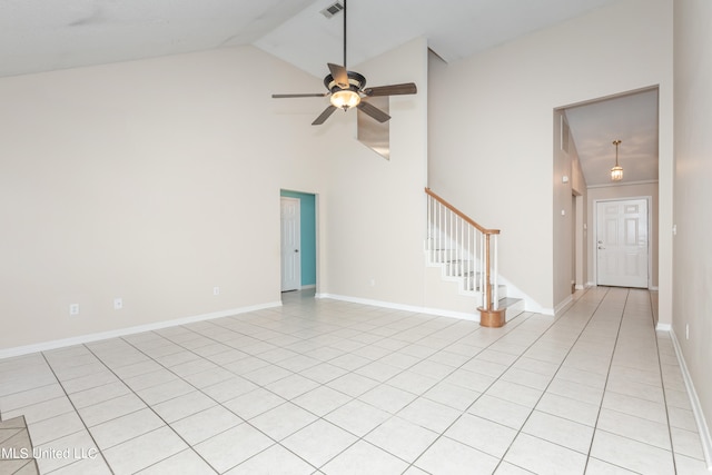 unfurnished living room featuring light tile patterned floors, high vaulted ceiling, and ceiling fan