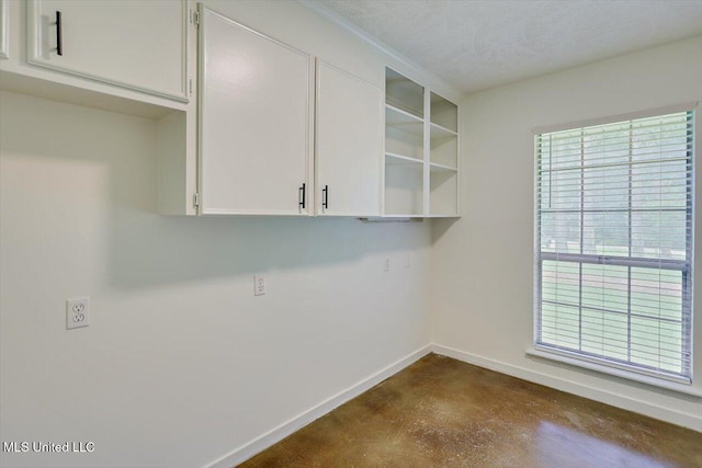 437 Henry Byrd Rd, Florence, MS 39073 - laundry room featuring baseboards