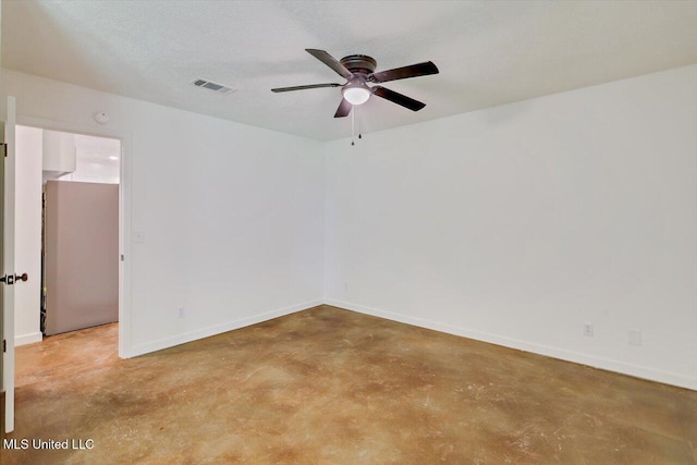 437 Henry Byrd Rd, Florence, MS 39073 - spare room with finished concrete flooring and ceiling fan