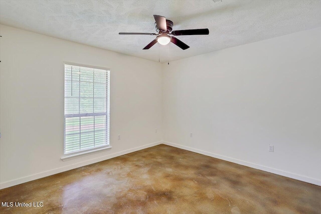 437 Henry Byrd Rd, Florence, MS 39073 - empty room featuring a ceiling fan and a textured ceiling