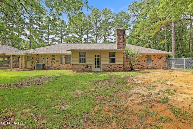 437 Henry Byrd Rd, Florence, MS 39073 - rear view of house featuring a chimney and brick siding