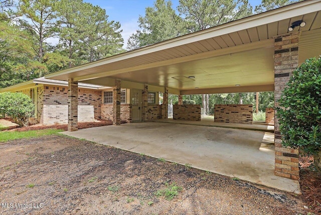 437 Henry Byrd Rd, Florence, MS 39073 - view of patio with driveway and a carport