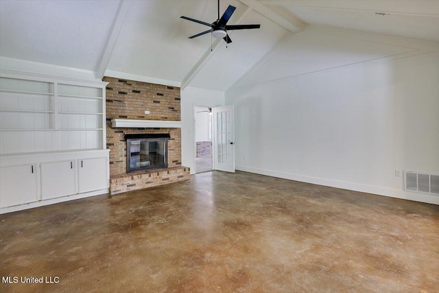 437 Henry Byrd Rd, Florence, MS 39073 - unfurnished living room with beamed ceiling, finished concrete flooring, a ceiling fan, a brick fireplace, and high vaulted ceiling