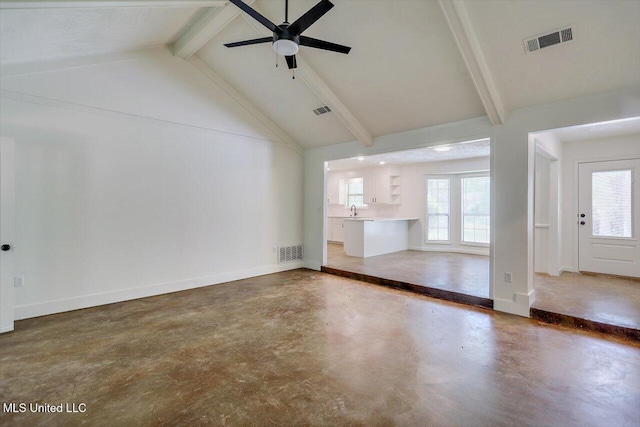 437 Henry Byrd Rd, Florence, MS 39073 - unfurnished living room featuring concrete flooring, beamed ceiling, ceiling fan, and high vaulted ceiling