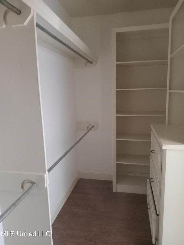 38 3rd St, Cleveland, MS 38732 - walk in closet featuring dark wood-style flooring