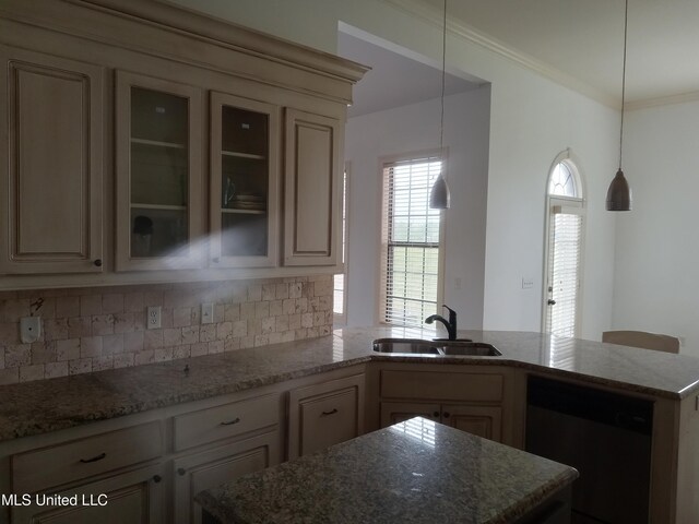 38 3rd St, Cleveland, MS 38732 - kitchen with backsplash, light stone countertops, dishwasher, a sink, and a peninsula
