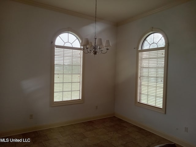 38 3rd St, Cleveland, MS 38732 - spare room with baseboards, a notable chandelier, and ornamental molding