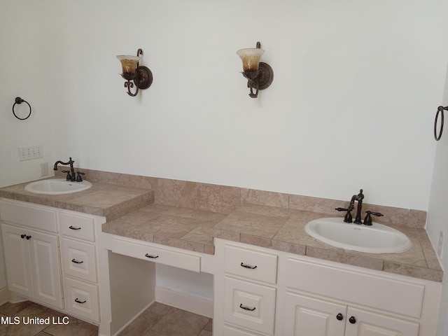 38 3rd St, Cleveland, MS 38732 - full bath featuring double vanity and a sink
