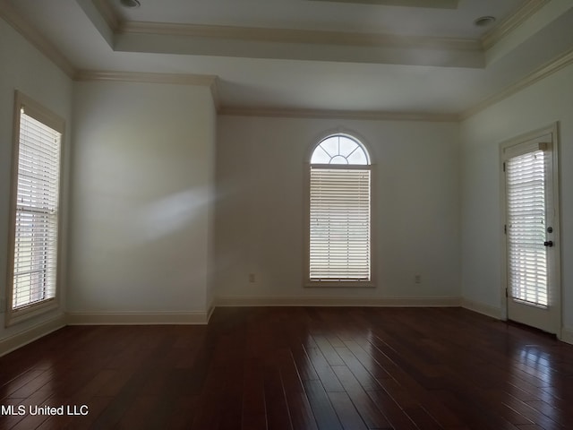 38 3rd St, Cleveland, MS 38732 - spare room with a raised ceiling, baseboards, and hardwood / wood-style floors