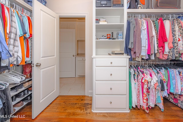 228 Falls Xing, Madison, MS 39110 - spacious closet with light tile patterned floors